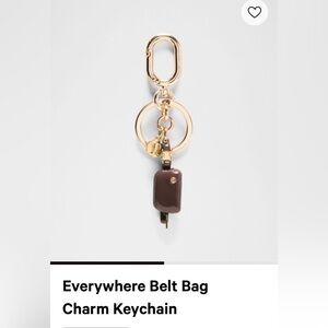 Lululemon everywhere belt bag charm key ring in goodnight plum and gold